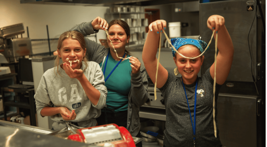 TKC Students showing the fresh pasta they just made.