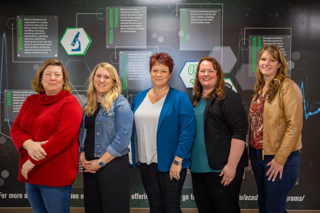 Five members of the Moraine Park Beaver Dam nursing faculty standing in a row.