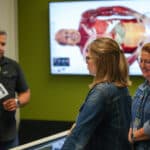 Family Learning about the Nursing Anatomage Table